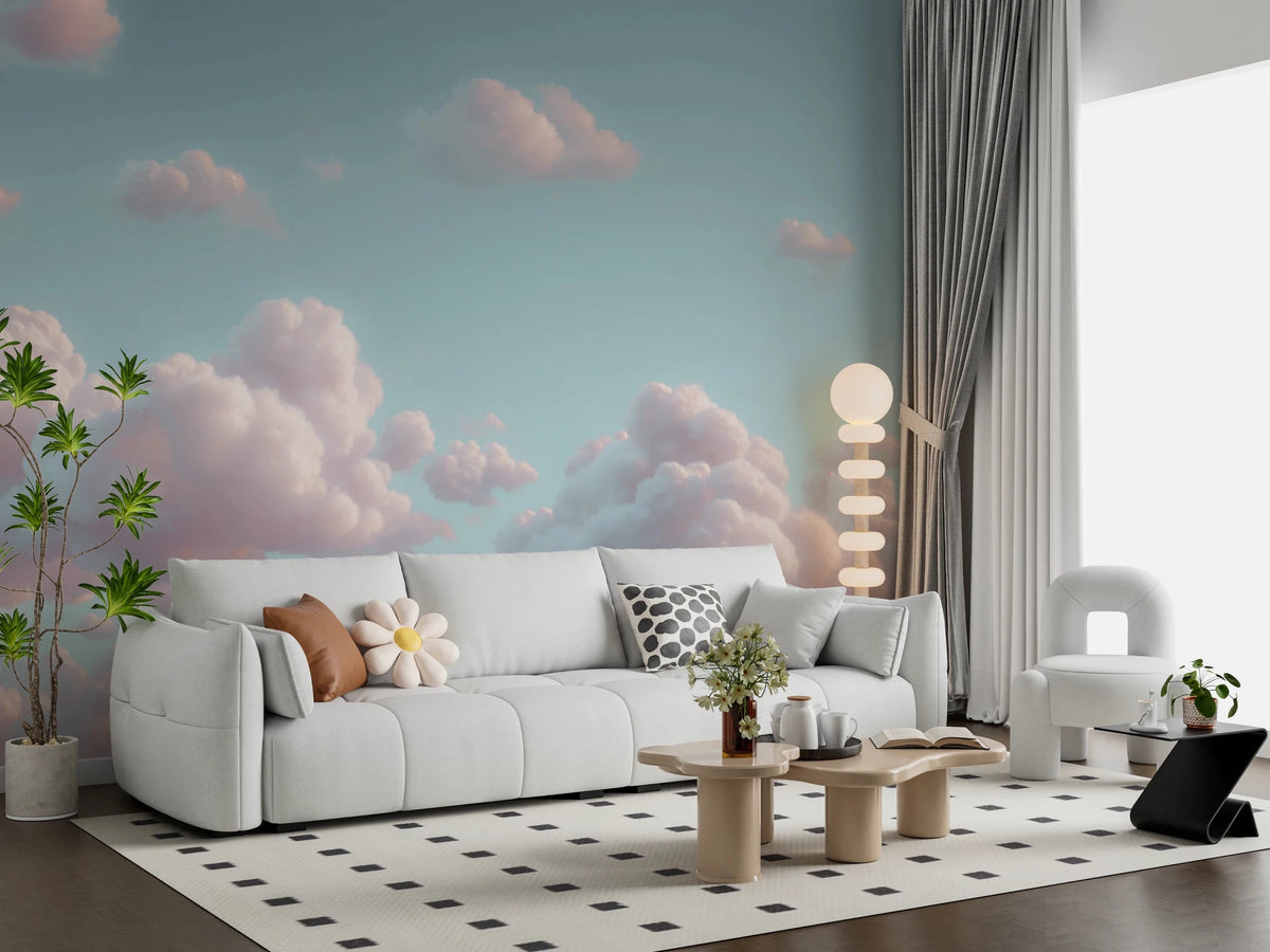 Dreamy Skies mural of soft pink clouds in a teal sky behind a white boucle sofa with a daisy cushion in a living room