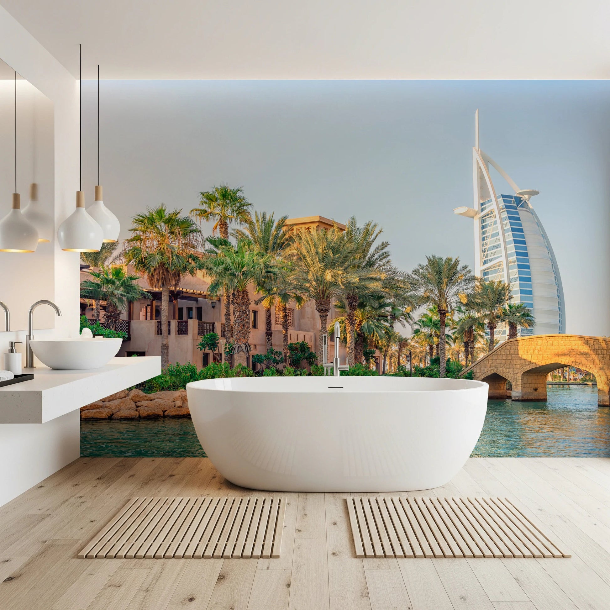 Dubai Oasis wallpaper mural of the Burj Al Arab and palms behind a white freestanding tub in a bathroom