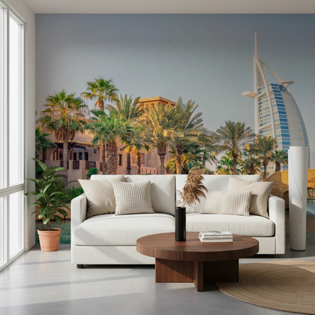 Dubai Oasis wallpaper mural of palms and the Burj Al Arab behind a white curved sofa in a living room