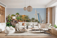 Dubai Oasis wallpaper mural of the Dubai skyline and palms behind a cream sofa in a bright living room