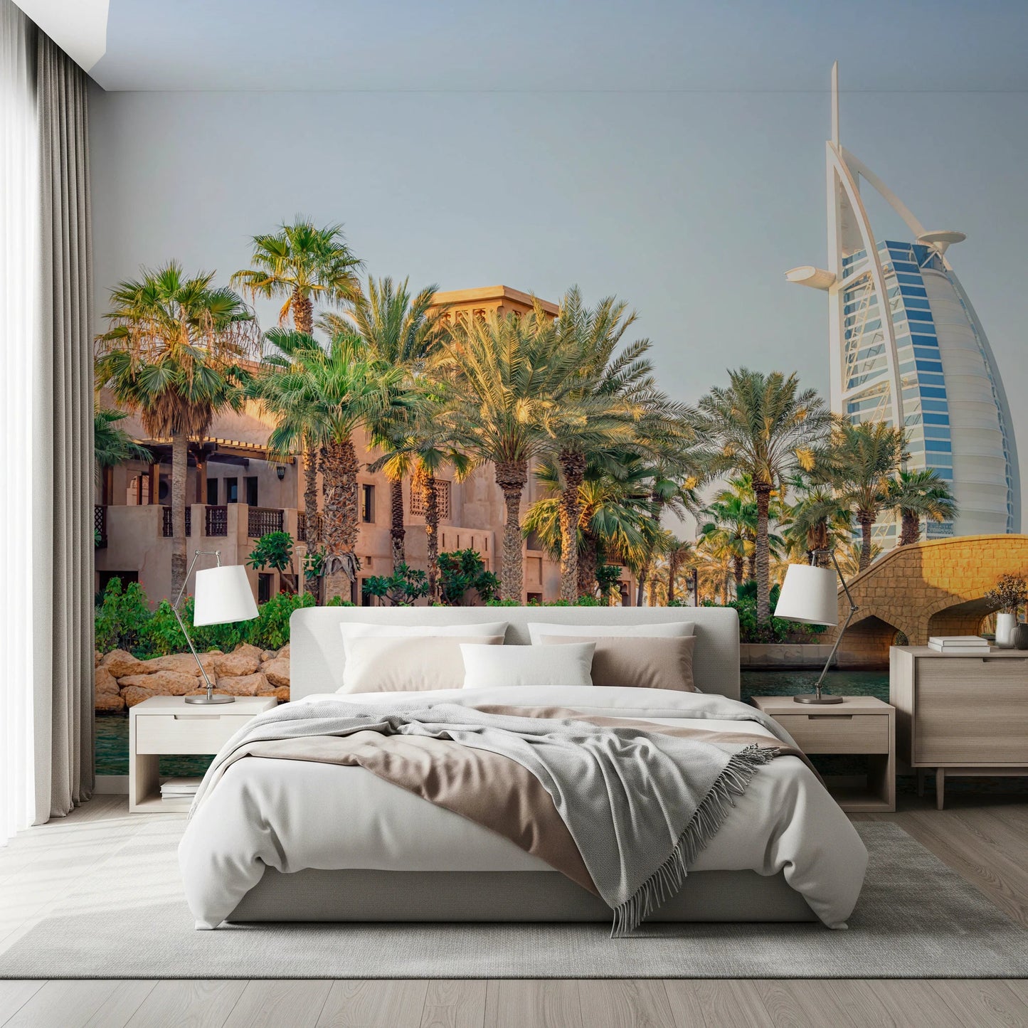 Dubai Oasis wallpaper mural of palms and the Burj Al Arab behind an upholstered bed in a bedroom