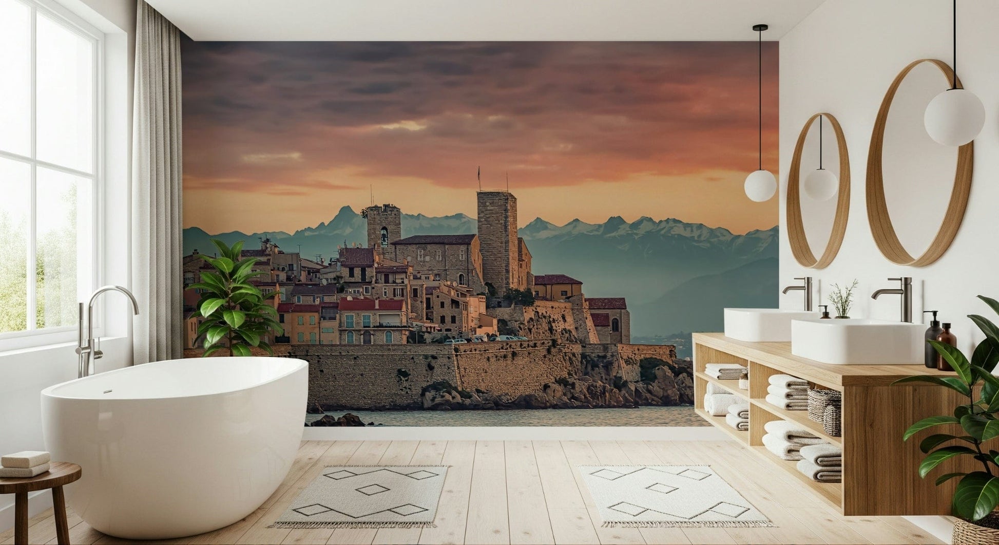 Romantic sunset mural of Antibes with layered mountains and a softly lit sky.