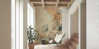 Dusky Ink Petals wallpaper mural in a sunlit hallway with butterfly chair and terracotta tiled stairs