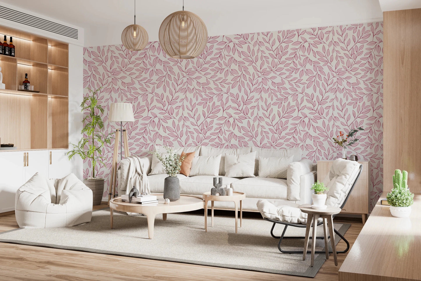 Dusty Rose Vines wallpaper of pink foliage behind a cream sofa and beanbag under woven rattan pendants