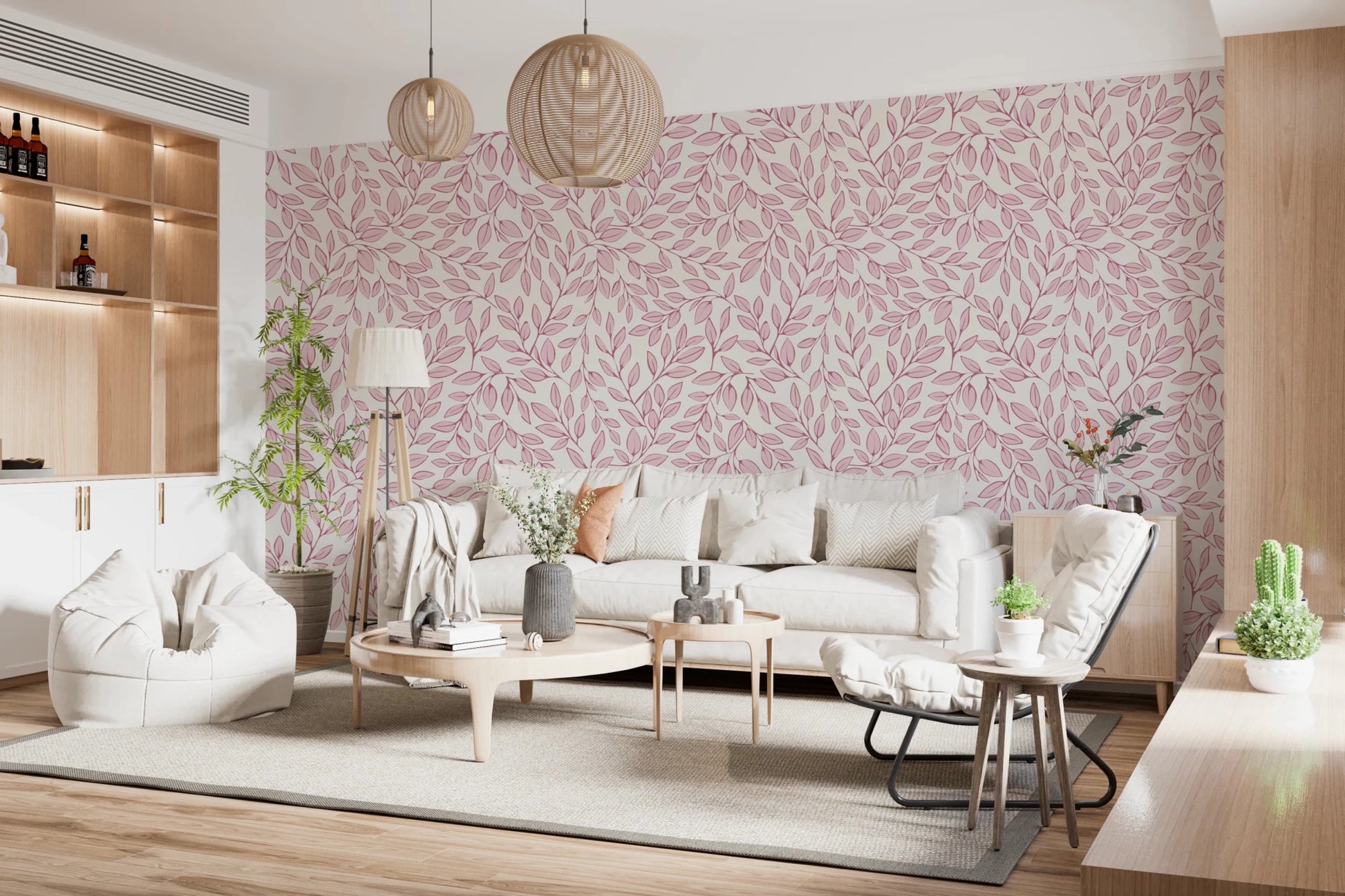 Dusty Rose Vines wallpaper of pink foliage behind a cream sofa and beanbag under woven rattan pendants