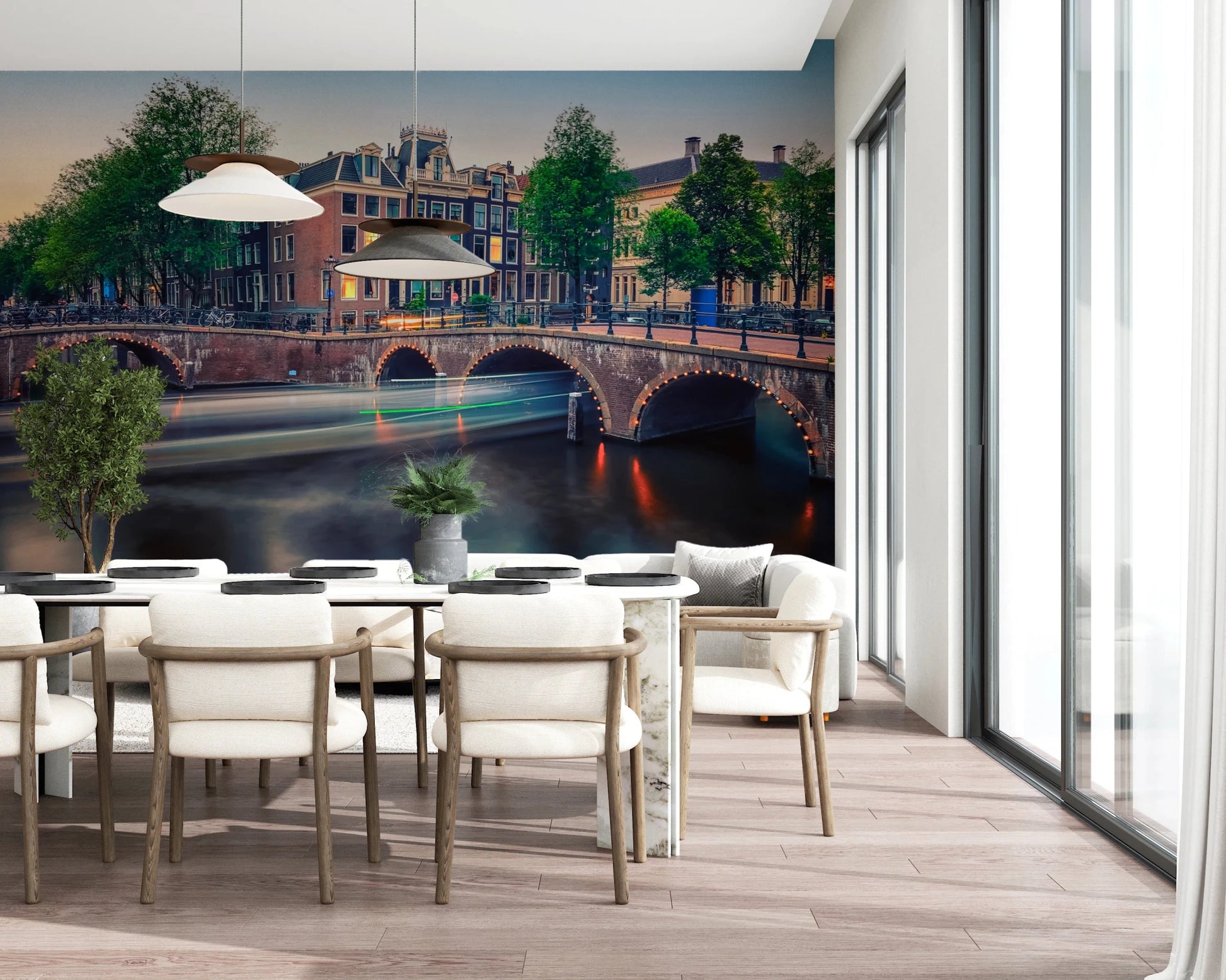Dutch Canal Dreams wallpaper mural of the canal and arched bridges behind a white dining table and chairs by windows