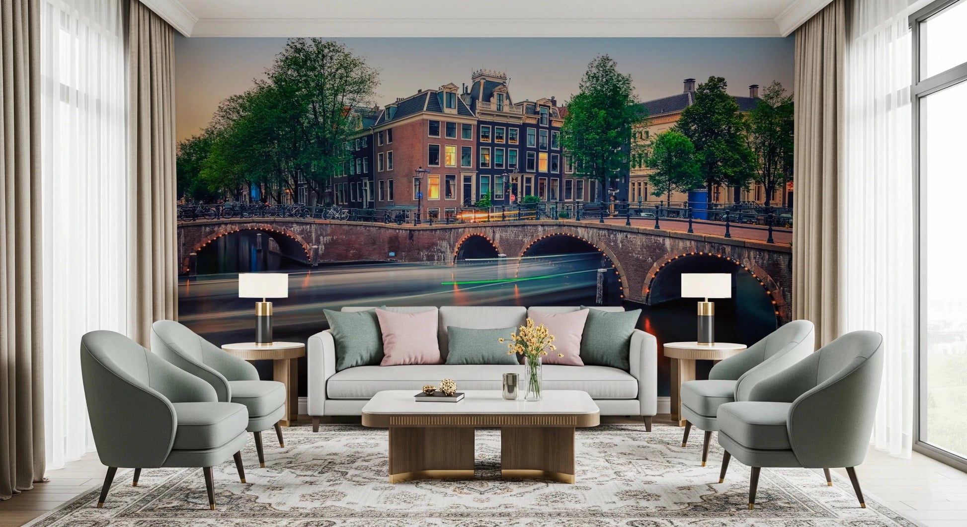 Dutch Canal Dreams wallpaper mural of the lit canal and bridge above a grey sofa flanked by armchairs and lamps