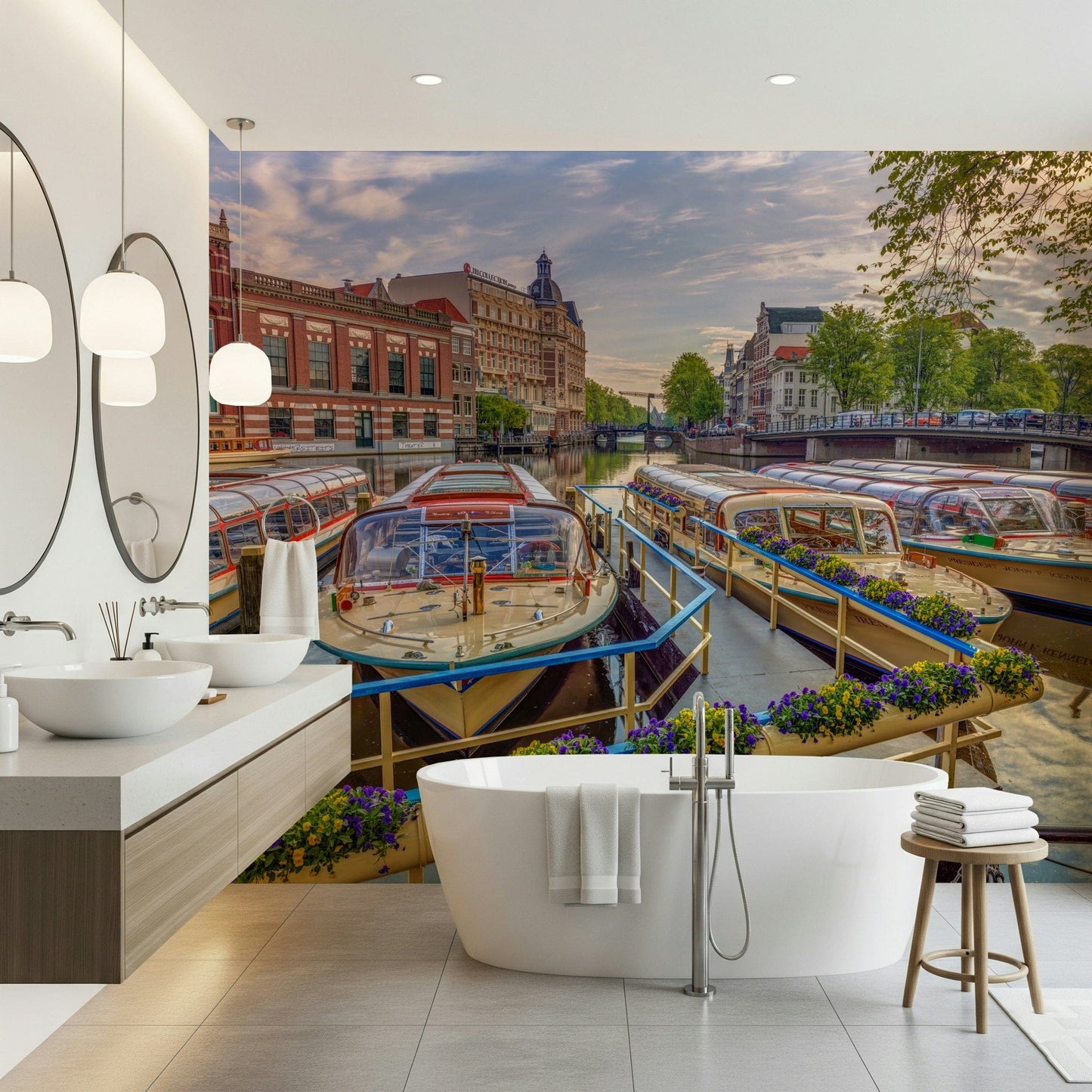 Dutch Waterways wallpaper mural of Amsterdam canal boats behind a freestanding tub and double vanity in a bathroom