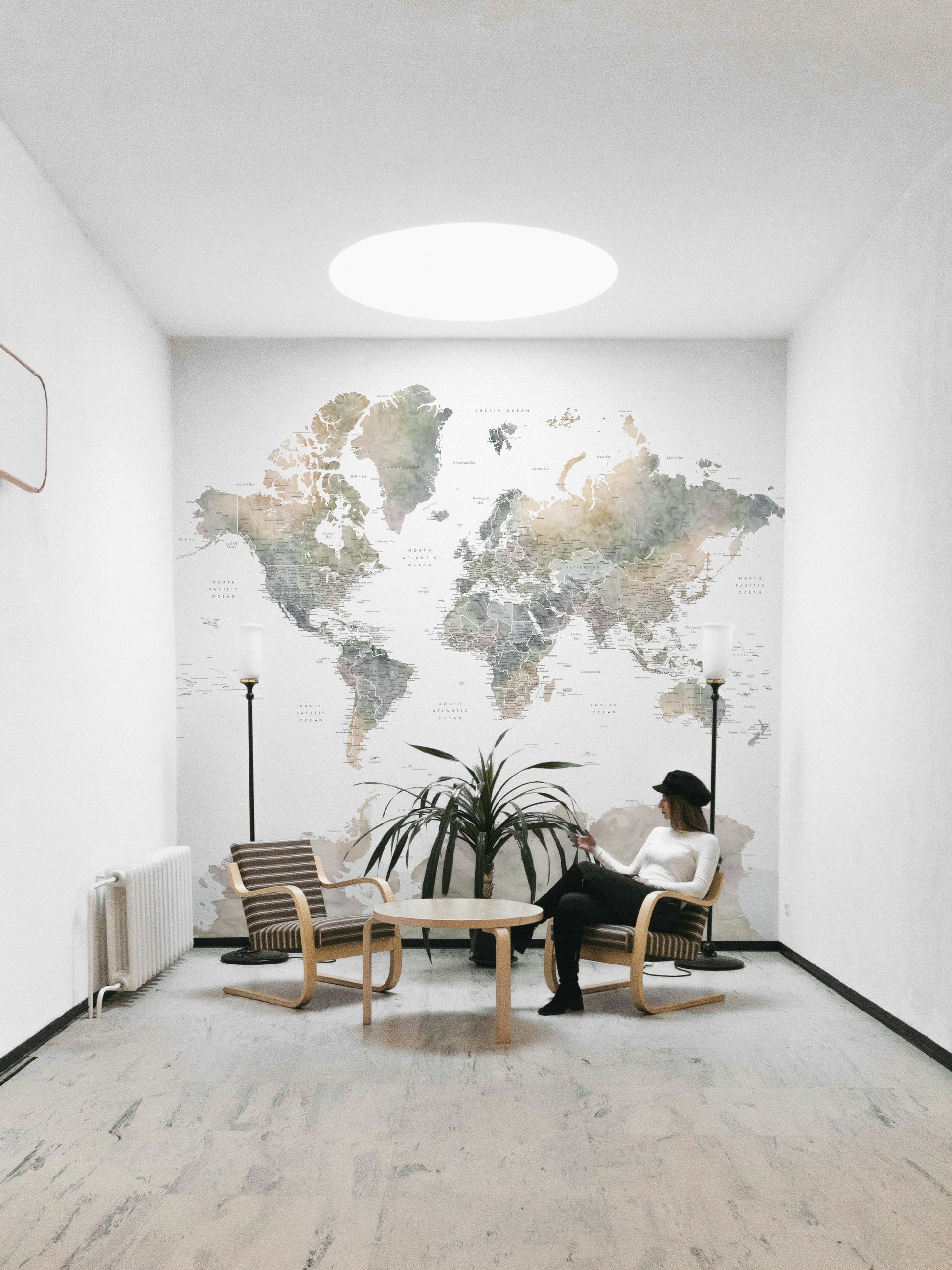 Nature-inspired map mural with warm watercolor shades

