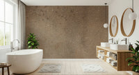 Earthy Canvas wallpaper mural in warm brown behind a white freestanding tub and wood vanity in a bright bathroom