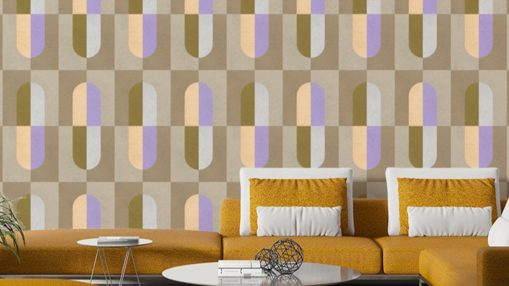 Earthy Hues wallpaper with retro olive, lilac and peach capsule shapes behind a mustard yellow sectional sofa in a living room