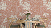 Soft terracotta and beige floral wallpaper in a bright apartment.