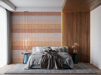 A warm-toned wallpaper showcasing irregular square grids in natural terracotta and sandy beige colors.