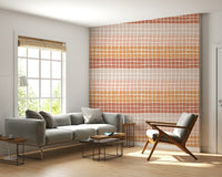 A minimal geometric wallpaper with irregular squares transitioning through warm earthy hues.