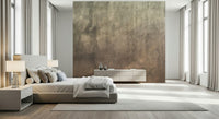 Earthy Textured Watercolour Mushroom wallpaper mural in taupe brown behind an upholstered bed in a bright bedroom