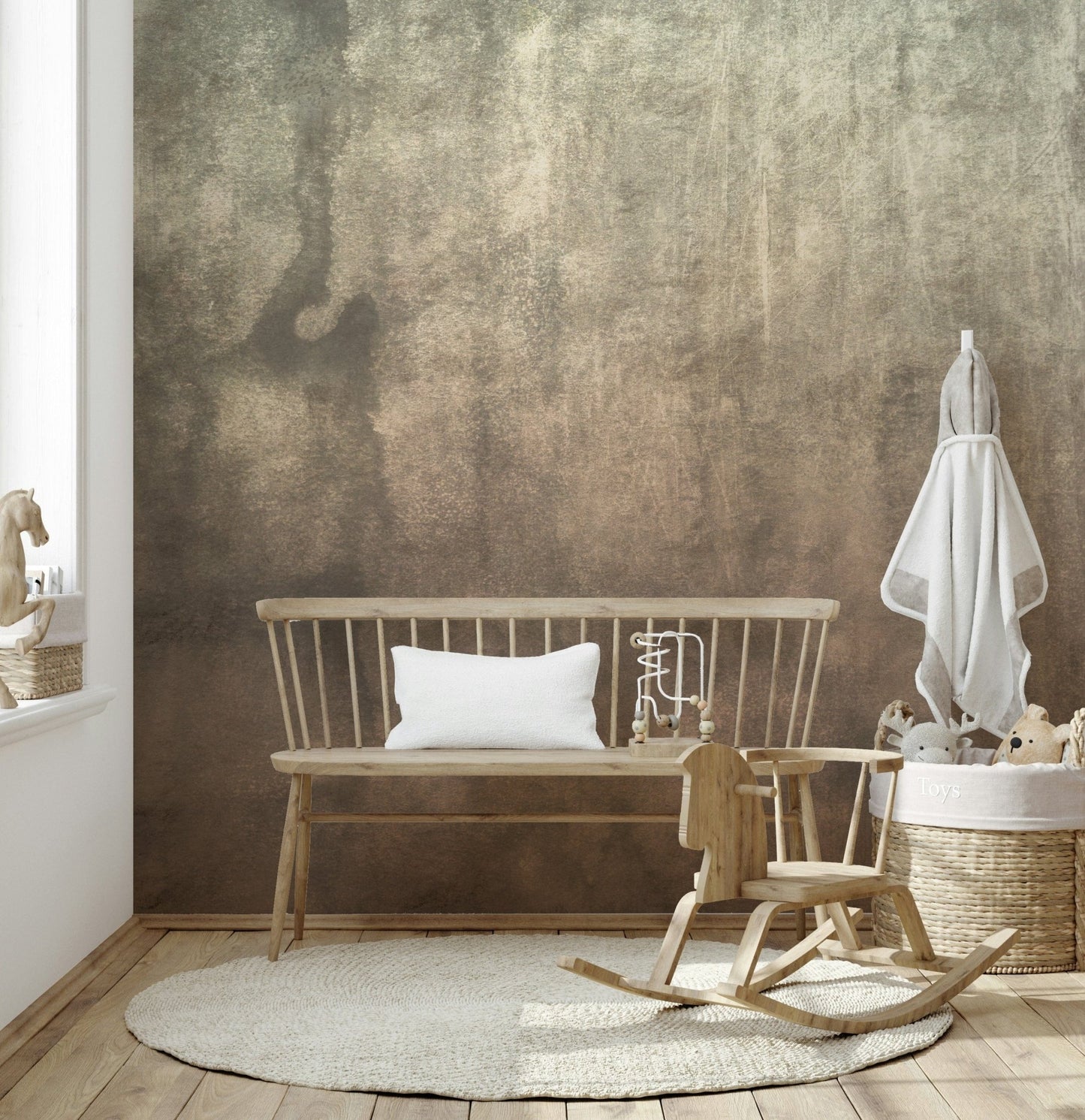 Earthy Textured Watercolour Mushroom wallpaper mural in warm taupe behind a wooden bench in a neutral nursery