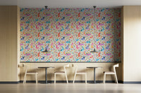 Meadow wallpaper with hopping Easter rabbits

