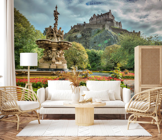 Edinburgh Castle wall mural with Ross Fountain and gardens behind a white sofa and rattan chairs
