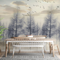 Eerie Foggy Forest Spooky Tree Halloween wallpaper mural styled as a feature wall behind a dining table and chairs