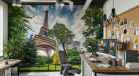 Eiffel Tower Greens wallpaper mural of the Eiffel Tower over a dual-monitor desk and mesh chair in a home office