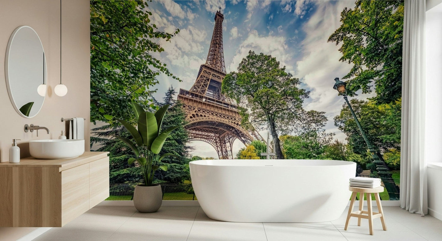 Eiffel Tower Greens wallpaper mural showing the Eiffel Tower in a bathroom with a freestanding tub and wood vanity