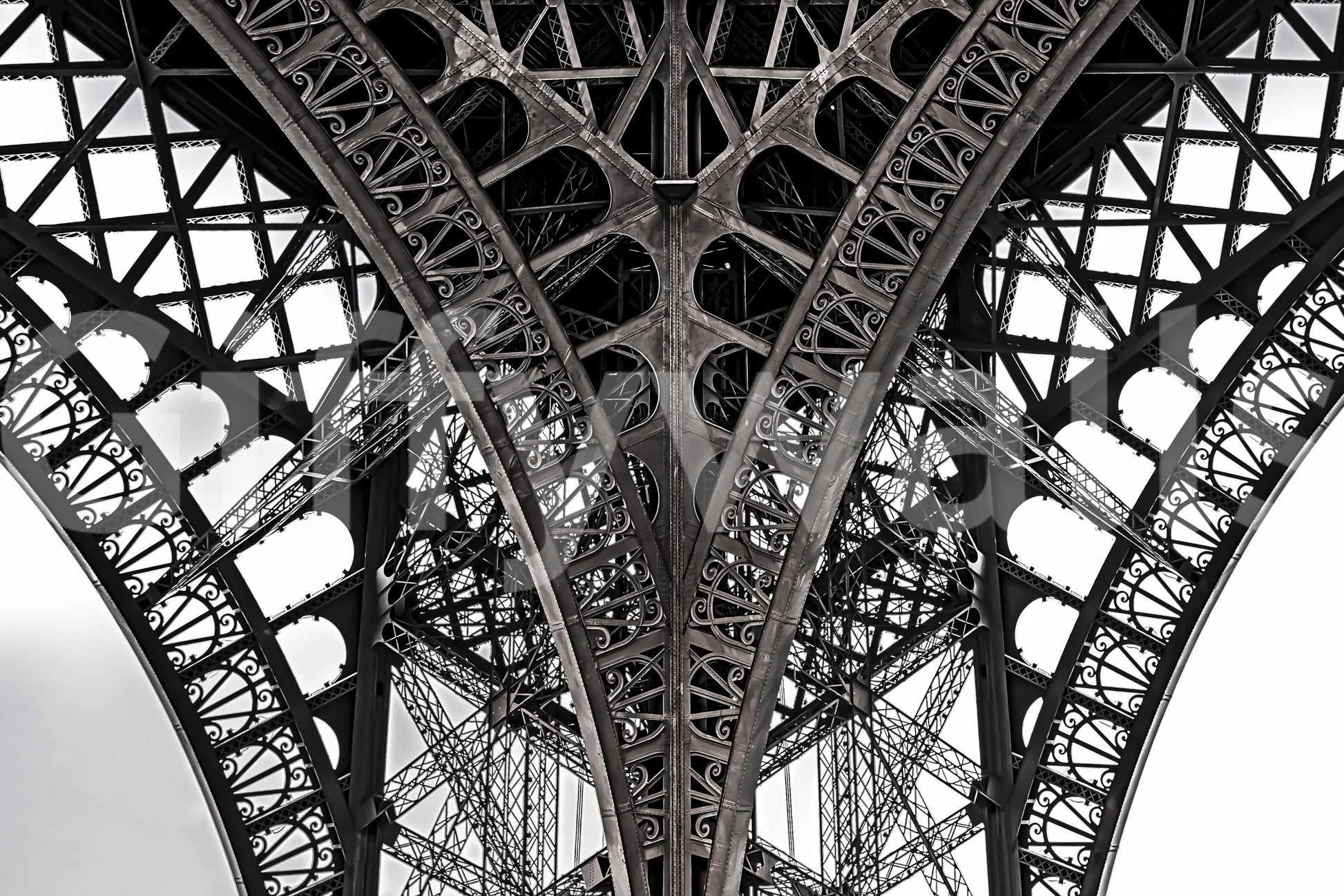 Contemporary lounge with Eiffel Tower wallpaper mural, gray tones, modern wall decor