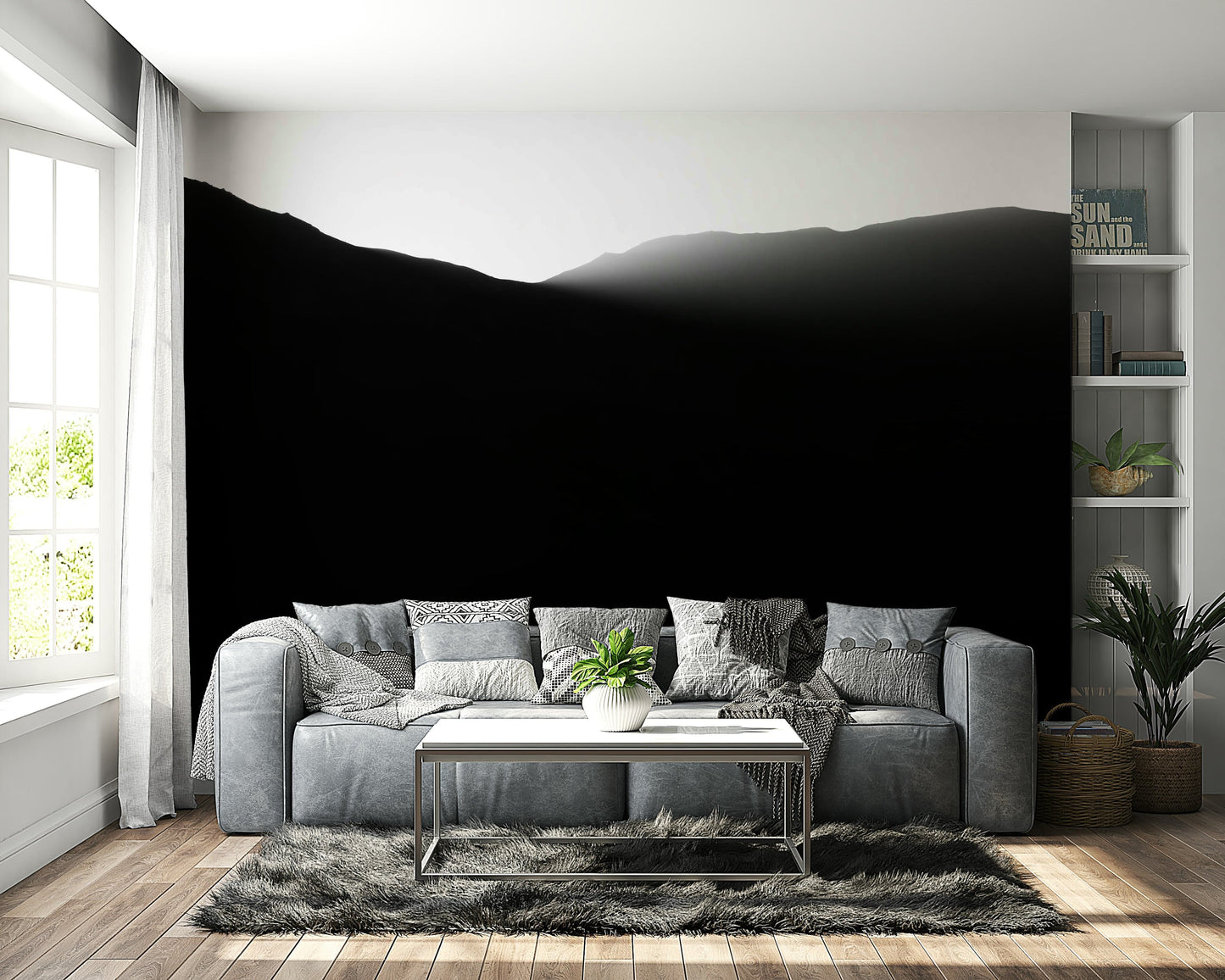 A close-up of the misty mountain ridges in black and white.

