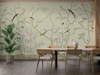 Deep navy dining area wall mural featuring golden birds and exotic flowers.