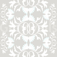 Graceful white vine wall mural over solid light grey.