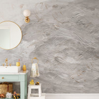 Subtle textured swirl wallpaper in gray tones
