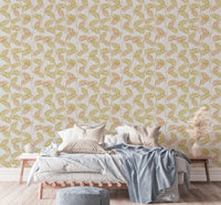 Elegant Palm Leaves wallpaper behind a wood bed with white and blue bedding and pampas grass