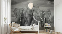 Wildlife-inspired wallpaper with a proud elephant as the central focus of the scene.