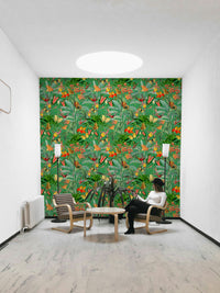 Lush tropical plants and bold emerald tones in wallpaper for walls

