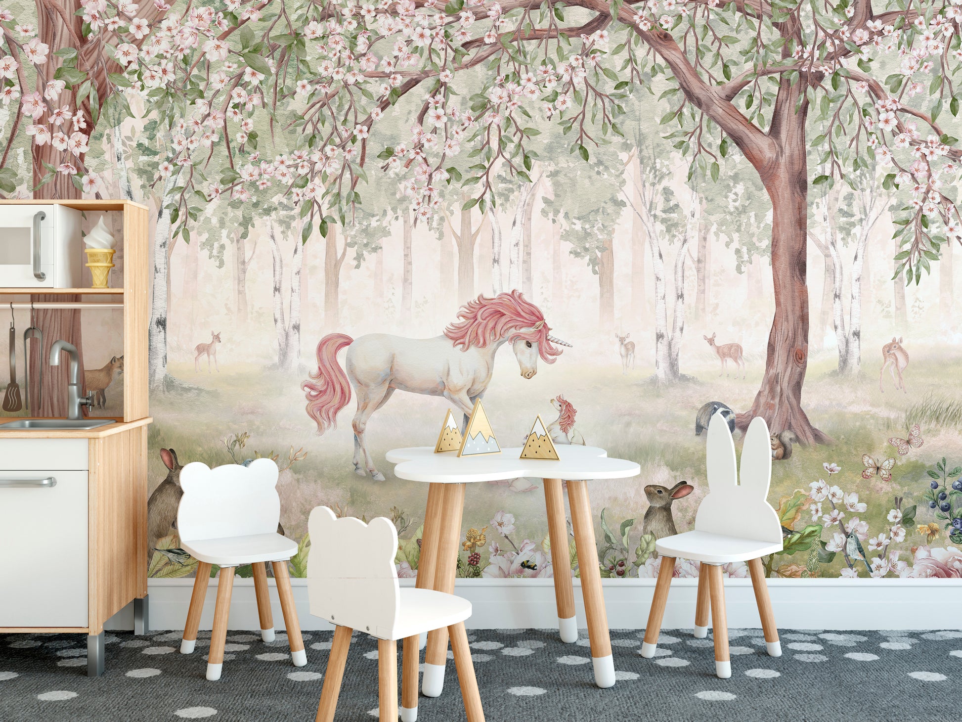 Unicorn Forest Green Wallpaper Mural peel and stick in a playroom with a blue sofa and a white play teepee.