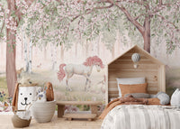 Removable self adhesive Unicorn Forest Green Wallpaper Mural in a study area with a wooden desk and chair.