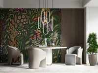 Wall mural depicting exotic Strelitzia flowers amidst lush green garden foliage.