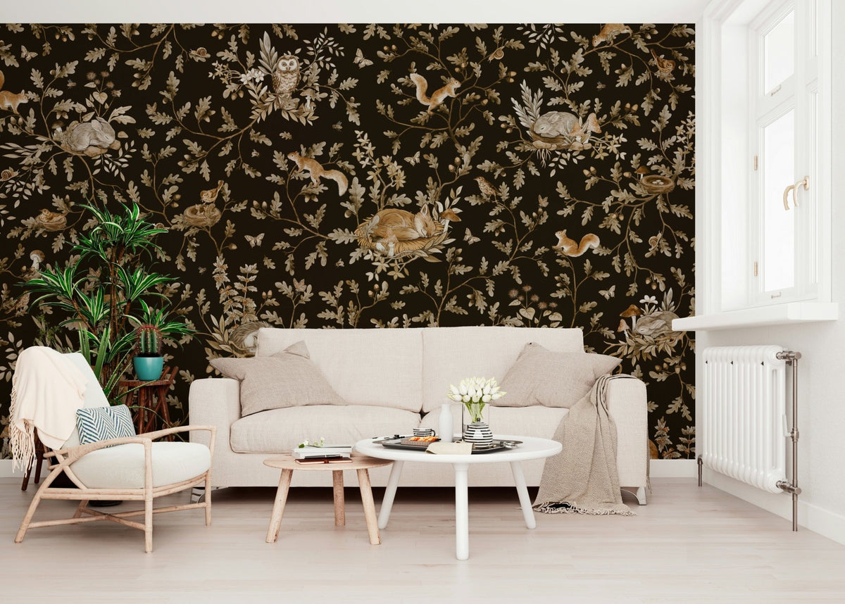 Enchanted Forest Naps wallpaper mural in espresso brown behind a cream sofa and white round table in a living room