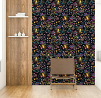 Serene wall mural with soft, delicate blooms and rich greenery.

