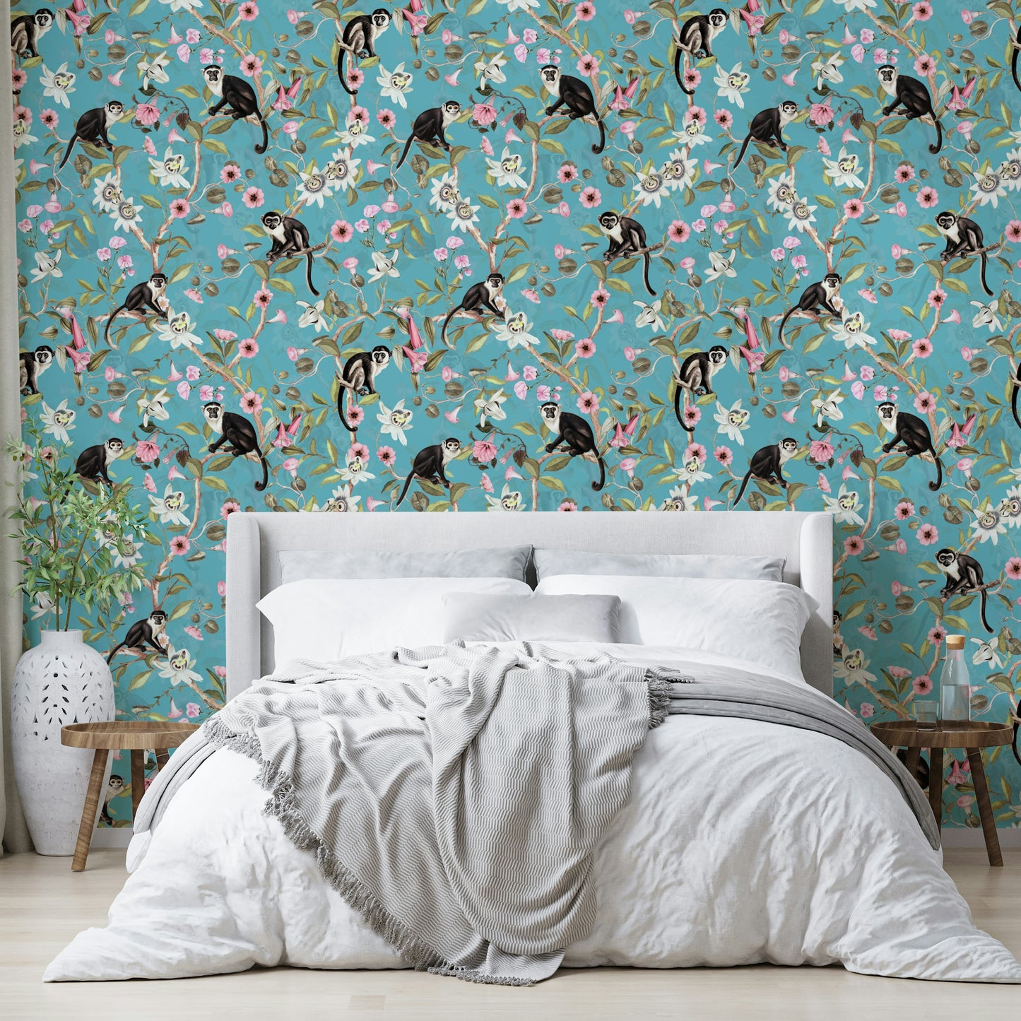 Playful jungle wallpaper featuring primates surrounded by vibrant flowers.

