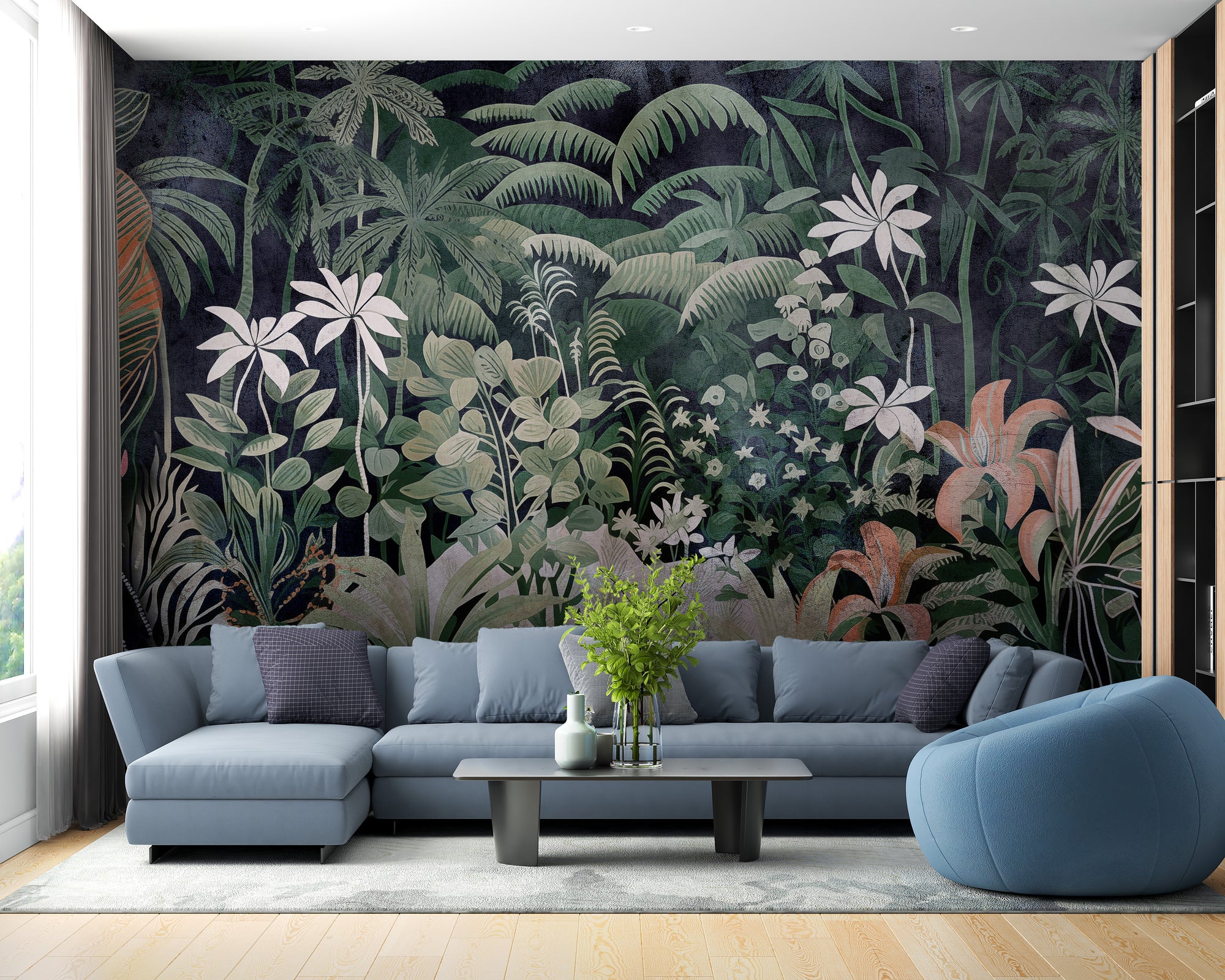 Equatorial Eden Vibrant Jungle wallpaper mural in dark green behind a blue sectional sofa in a bright living room