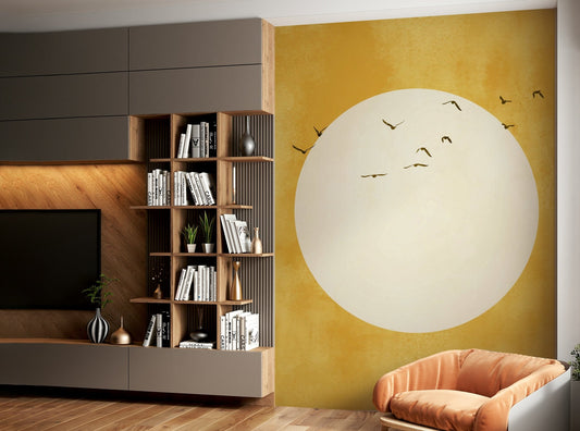 Modern apartment wall decor with a golden sunrise theme.