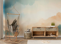 Ethereal Cloud Horizons Wall Mural behind a velvet armchair.