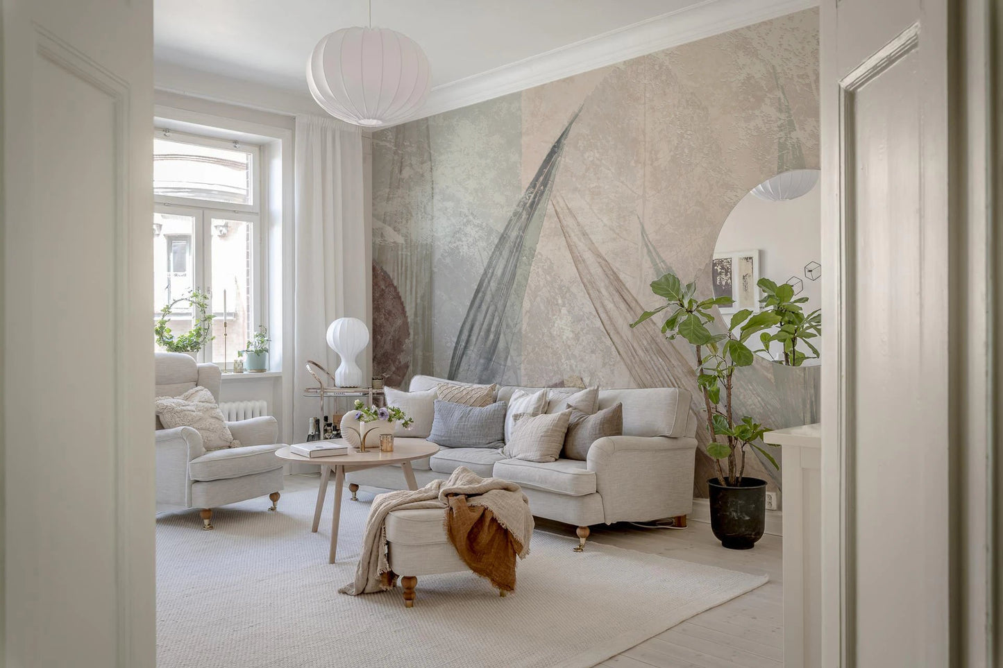 Subtle sage accents in the Ethereal Leaves Cream Wall Mural.