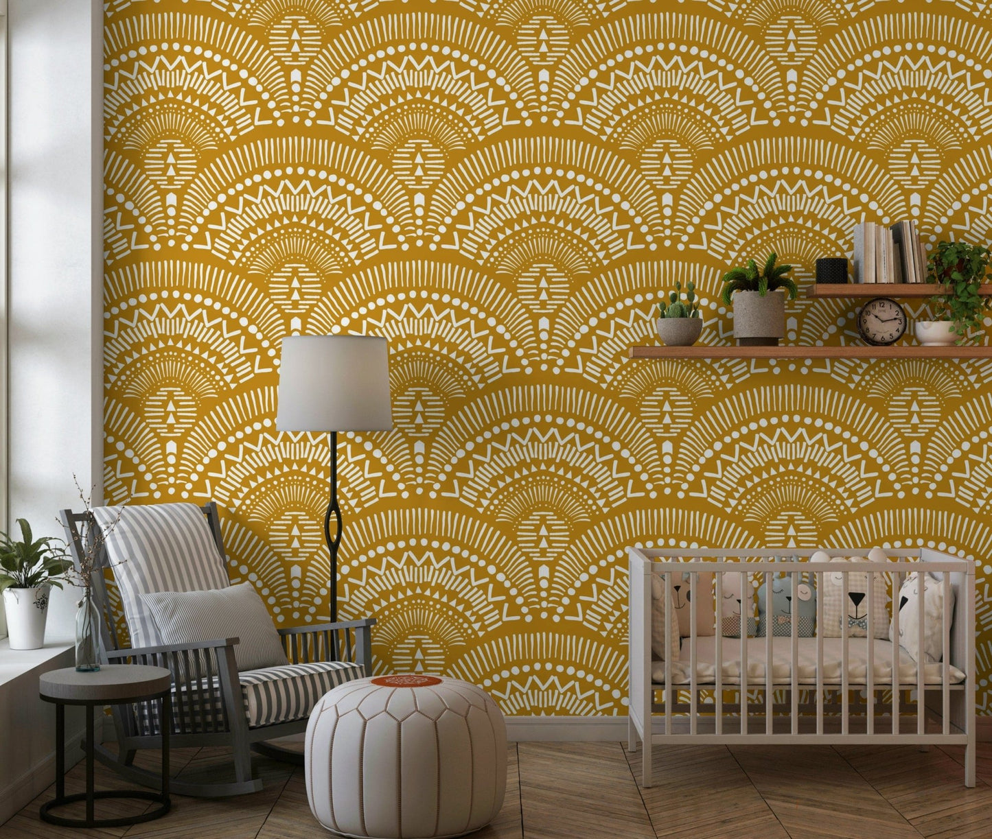 Ethnic Echoes wallpaper in mustard yellow behind a white crib and striped armchair in a nursery