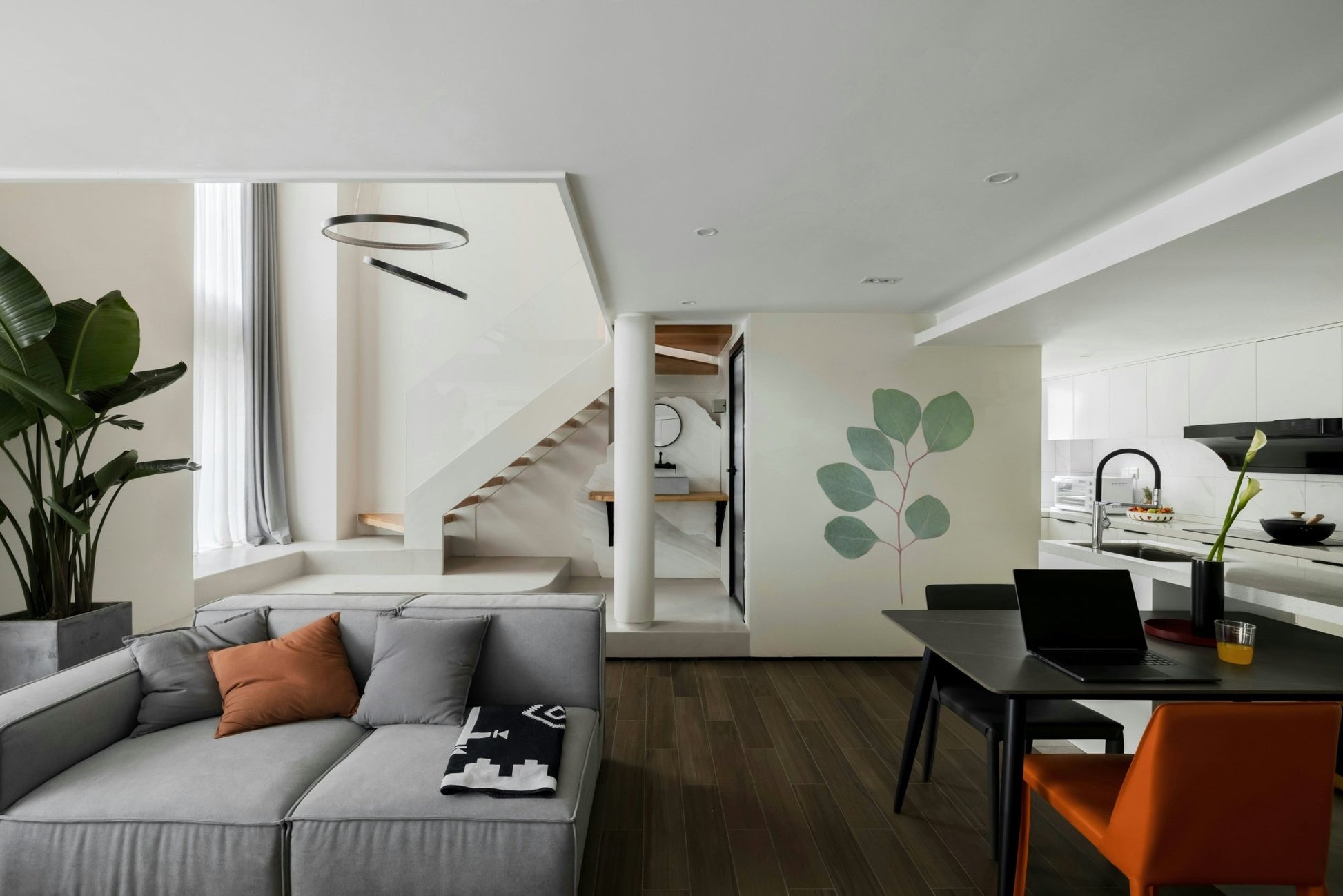 Eucalyptus Elegance Wall Mural featuring soft green leaves.

