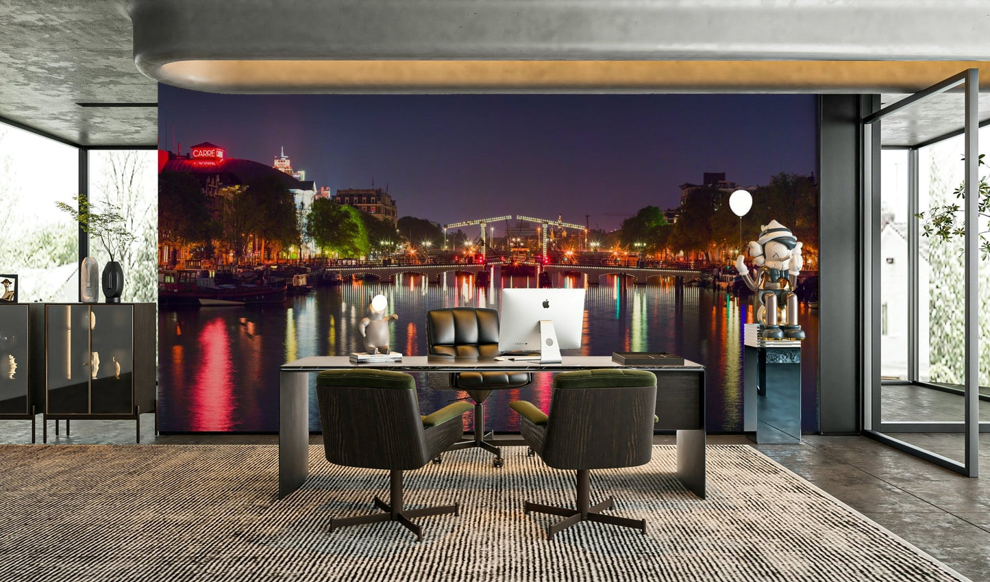 The image shows a serene view of a canal in Amsterdam at evening.

