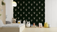 A minimalist home office with the botanical wallpaper.