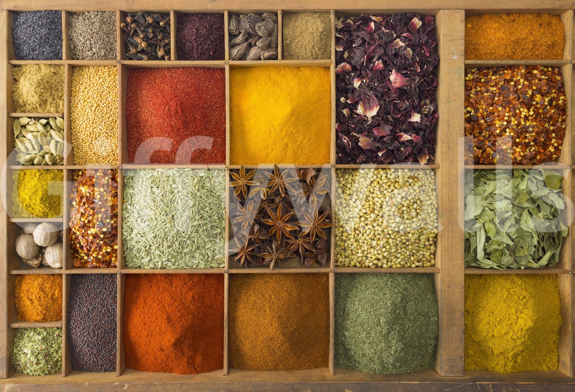 Exotic Spice Collection wallpaper mural shown full-wall, a grid of dried spices and herbs in wood trays