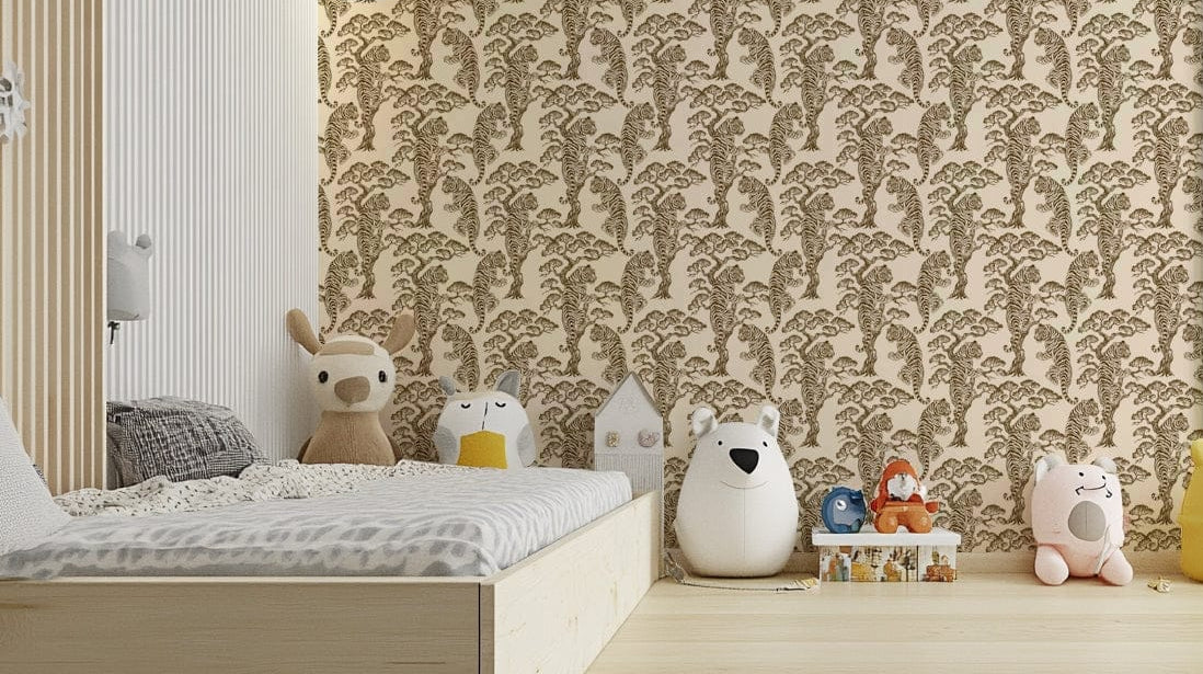 A bedroom with the lush foliage mural behind the headboard.