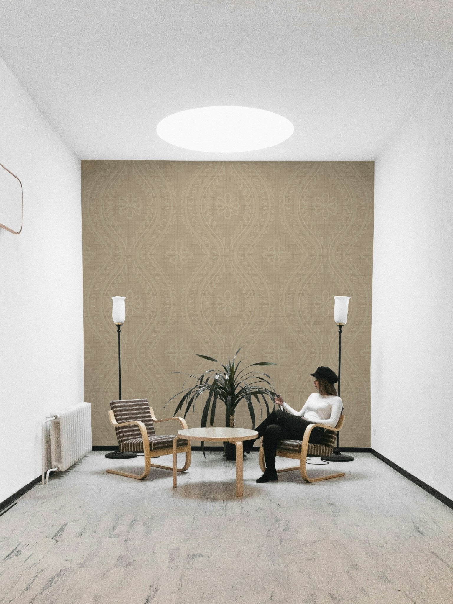 Weathered damask wall design with safari tones


